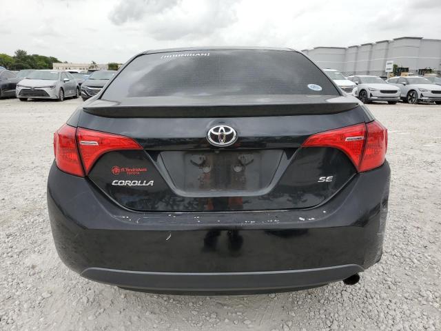 Photo 5 VIN: 5YFBURHE6JP831771 - TOYOTA COROLLA 