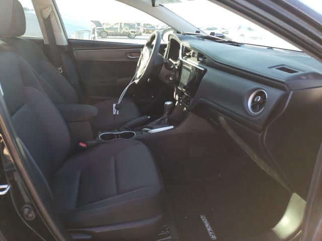 Photo 4 VIN: 5YFBURHE6JP850403 - TOYOTA COROLLA L 