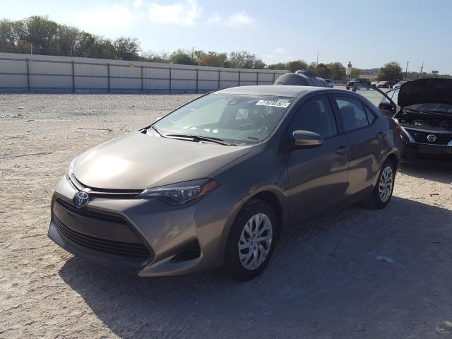 Photo 1 VIN: 5YFBURHE6KP856218 - TOYOTA COROLLA L 