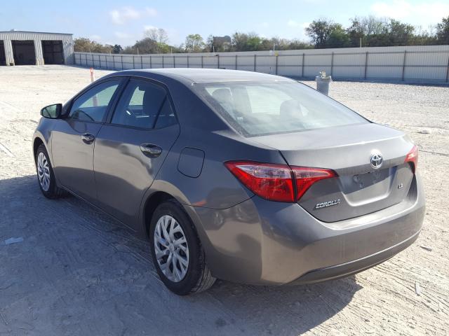 Photo 2 VIN: 5YFBURHE6KP856218 - TOYOTA COROLLA L 