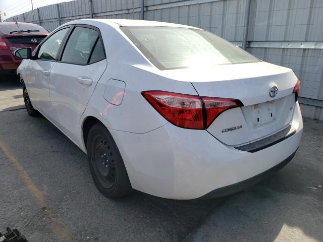 Photo 2 VIN: 5YFBURHE6KP857174 - TOYOTA COROLLA L 