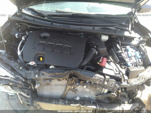 Photo 9 VIN: 5YFBURHE6KP858311 - TOYOTA COROLLA 