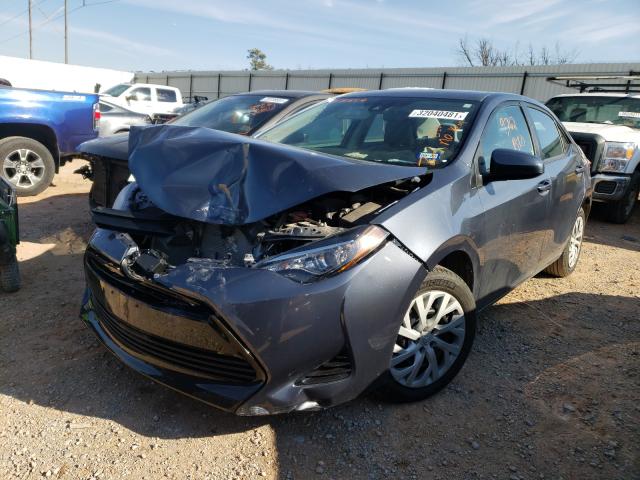 Photo 1 VIN: 5YFBURHE6KP858857 - TOYOTA COROLLA L 