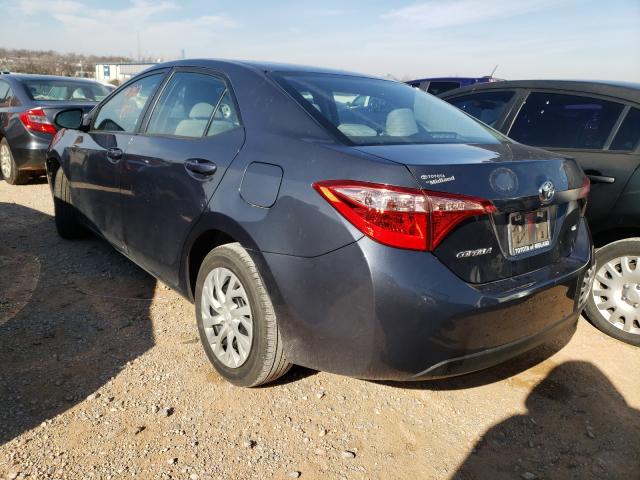 Photo 2 VIN: 5YFBURHE6KP858857 - TOYOTA COROLLA L 