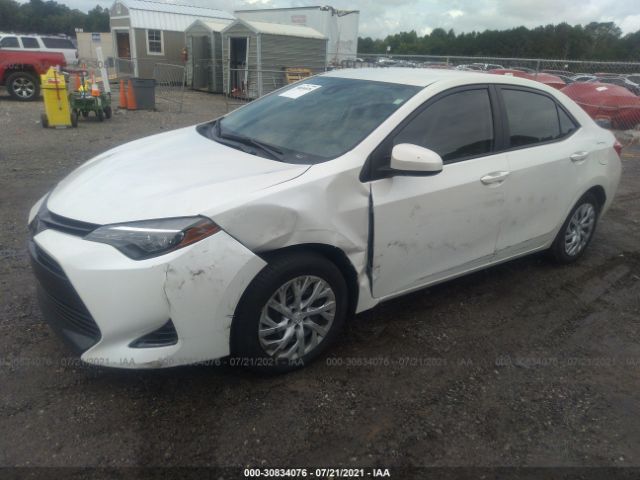 Photo 1 VIN: 5YFBURHE6KP859166 - TOYOTA COROLLA 