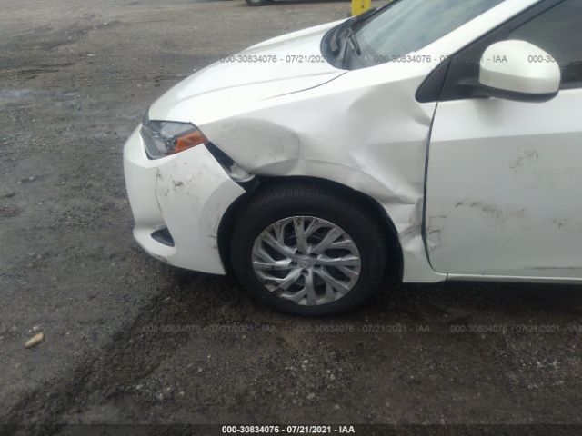 Photo 5 VIN: 5YFBURHE6KP859166 - TOYOTA COROLLA 