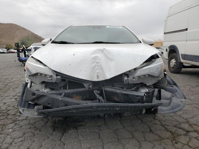 Photo 4 VIN: 5YFBURHE6KP861192 - TOYOTA COROLLA L 