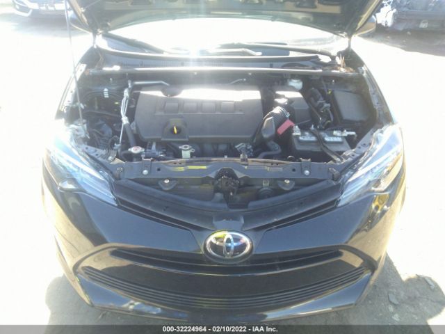 Photo 9 VIN: 5YFBURHE6KP861872 - TOYOTA COROLLA 