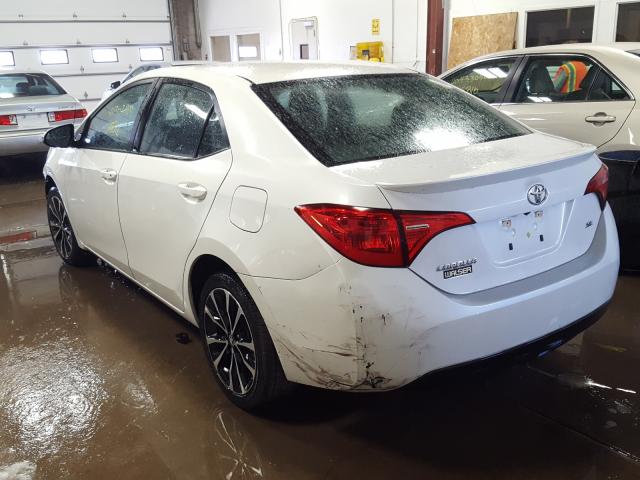 Photo 2 VIN: 5YFBURHE6KP864058 - TOYOTA COROLLA L 