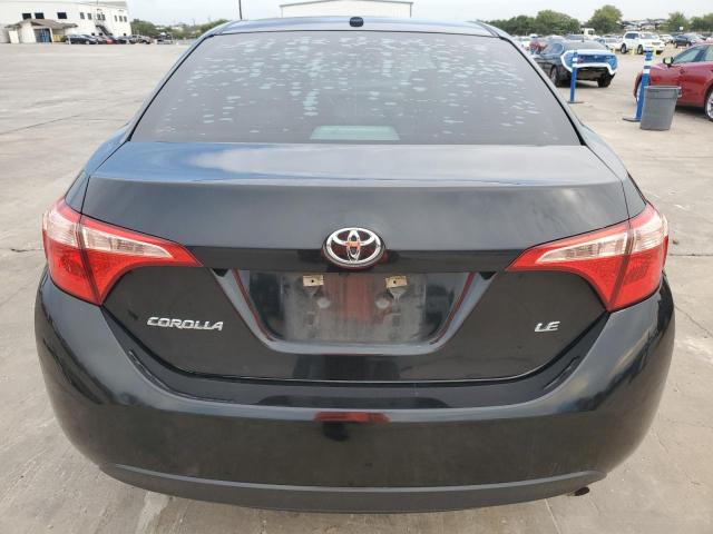 Photo 5 VIN: 5YFBURHE6KP864285 - TOYOTA COROLLA L 