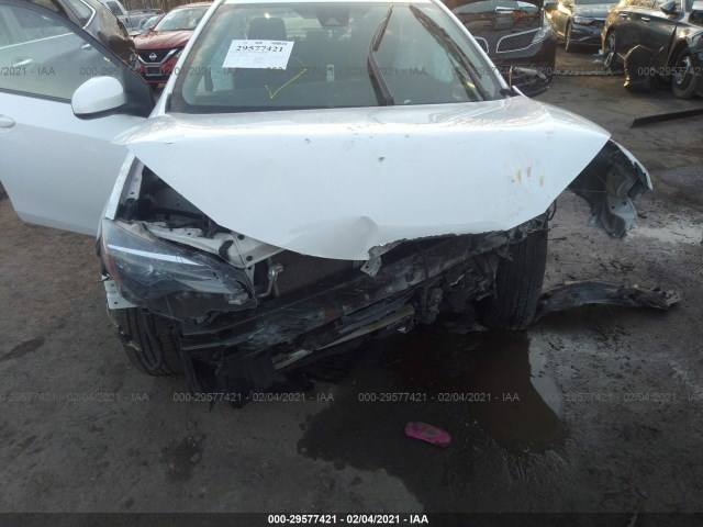 Photo 5 VIN: 5YFBURHE6KP865422 - TOYOTA COROLLA 