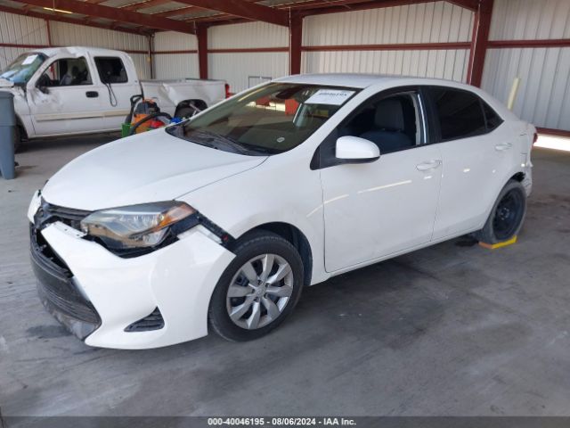 Photo 1 VIN: 5YFBURHE6KP867056 - TOYOTA COROLLA 