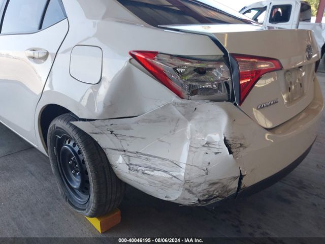 Photo 5 VIN: 5YFBURHE6KP867056 - TOYOTA COROLLA 