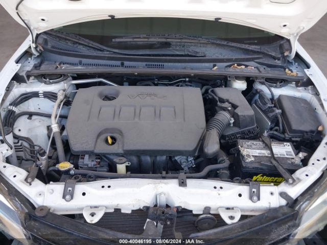 Photo 9 VIN: 5YFBURHE6KP867056 - TOYOTA COROLLA 