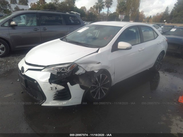 Photo 1 VIN: 5YFBURHE6KP870541 - TOYOTA COROLLA 