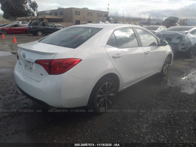 Photo 3 VIN: 5YFBURHE6KP870541 - TOYOTA COROLLA 