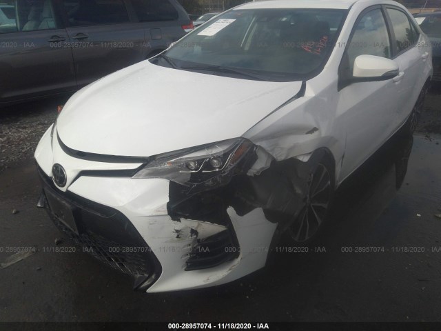 Photo 5 VIN: 5YFBURHE6KP870541 - TOYOTA COROLLA 