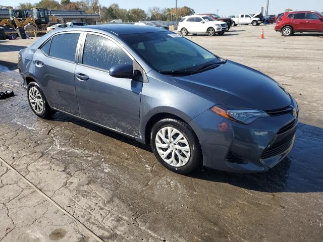 Photo 3 VIN: 5YFBURHE6KP871477 - TOYOTA COROLLA L 