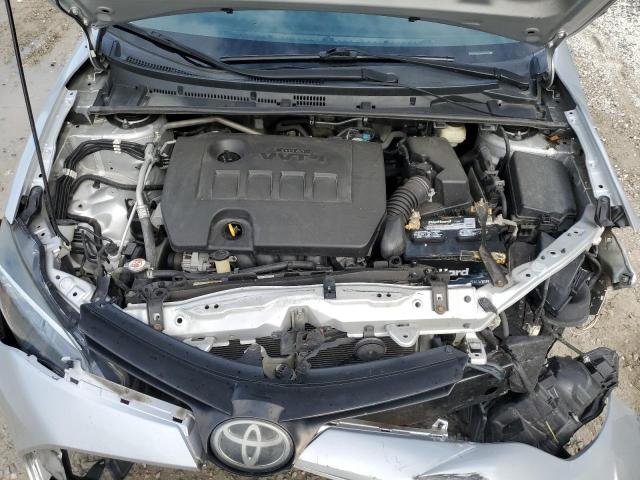 Photo 10 VIN: 5YFBURHE6KP872256 - TOYOTA COROLLA L 