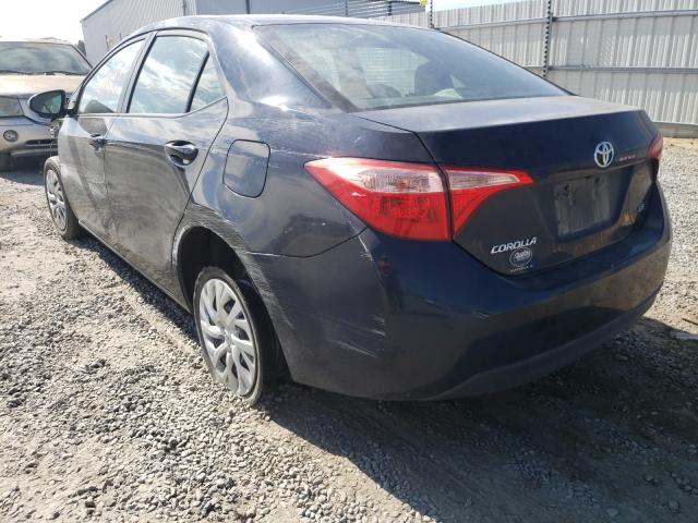 Photo 2 VIN: 5YFBURHE6KP874587 - TOYOTA COROLLA L 