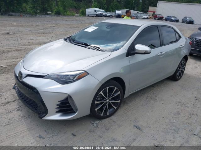 Photo 1 VIN: 5YFBURHE6KP876419 - TOYOTA COROLLA 