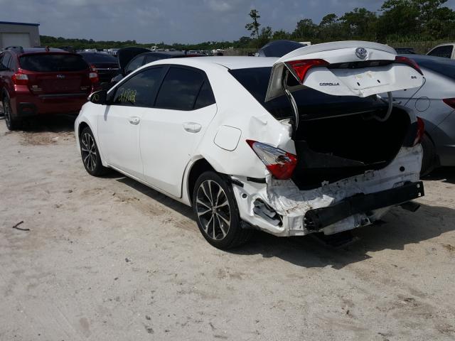 Photo 8 VIN: 5YFBURHE6KP878381 - TOYOTA COROLLA L 