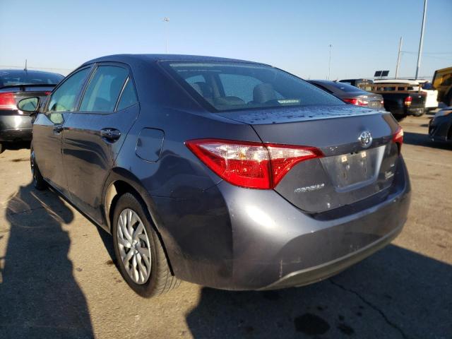 Photo 2 VIN: 5YFBURHE6KP878431 - TOYOTA COROLLA L 