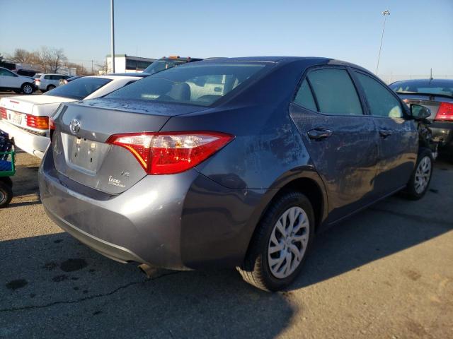 Photo 3 VIN: 5YFBURHE6KP878431 - TOYOTA COROLLA L 