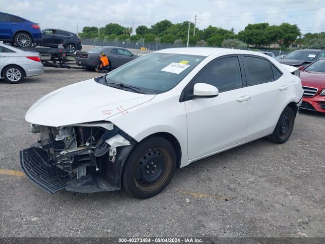 Photo 1 VIN: 5YFBURHE6KP878901 - TOYOTA COROLLA 