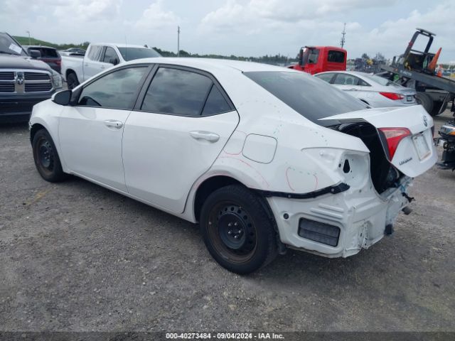 Photo 2 VIN: 5YFBURHE6KP878901 - TOYOTA COROLLA 