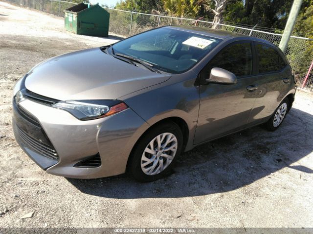 Photo 1 VIN: 5YFBURHE6KP879546 - TOYOTA COROLLA 