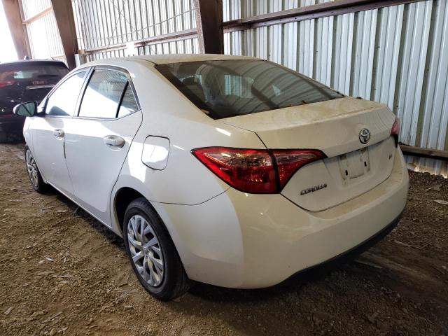 Photo 2 VIN: 5YFBURHE6KP879899 - TOYOTA COROLLA L 