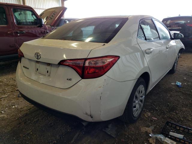 Photo 3 VIN: 5YFBURHE6KP879899 - TOYOTA COROLLA L 