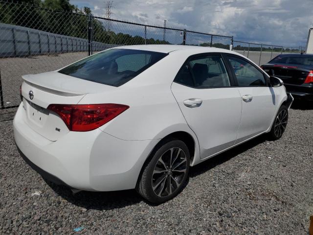 Photo 2 VIN: 5YFBURHE6KP881751 - TOYOTA COROLLA L 