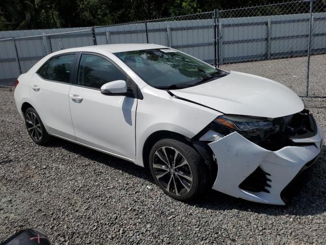 Photo 3 VIN: 5YFBURHE6KP881751 - TOYOTA COROLLA L 