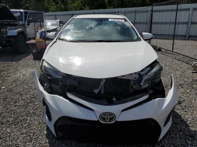 Photo 4 VIN: 5YFBURHE6KP881751 - TOYOTA COROLLA L 