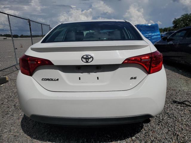 Photo 5 VIN: 5YFBURHE6KP881751 - TOYOTA COROLLA L 