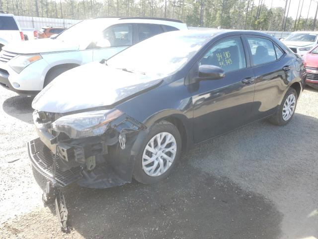 Photo 1 VIN: 5YFBURHE6KP882480 - TOYOTA COROLLA L 