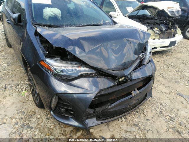 Photo 5 VIN: 5YFBURHE6KP883161 - TOYOTA COROLLA 