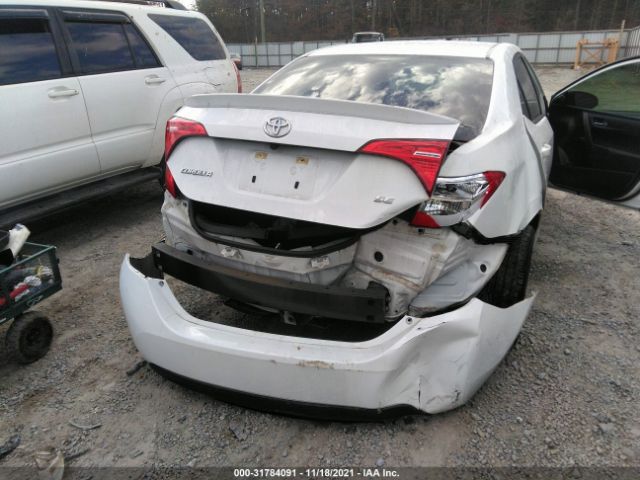 Photo 5 VIN: 5YFBURHE6KP883323 - TOYOTA COROLLA 