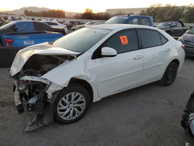 Photo 0 VIN: 5YFBURHE6KP884116 - TOYOTA COROLLA L 