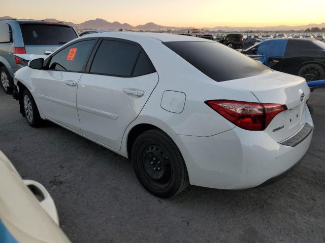 Photo 1 VIN: 5YFBURHE6KP884116 - TOYOTA COROLLA L 