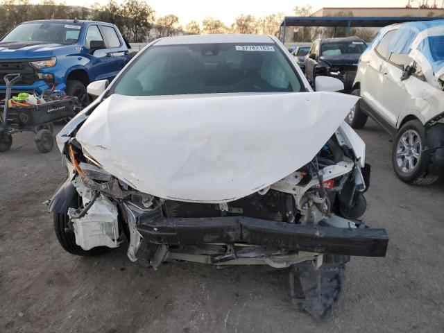 Photo 4 VIN: 5YFBURHE6KP884116 - TOYOTA COROLLA L 