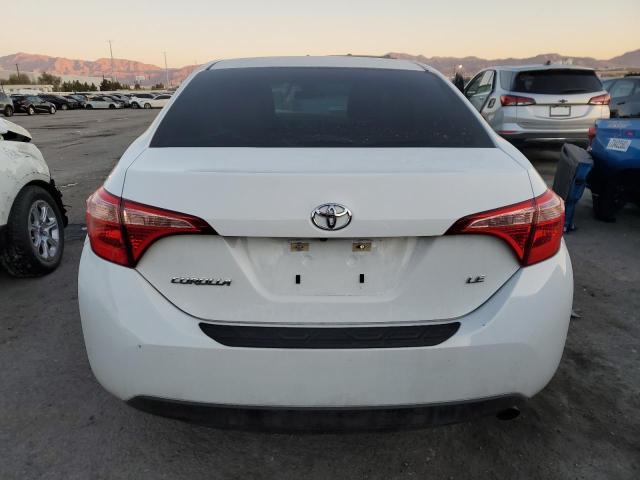 Photo 5 VIN: 5YFBURHE6KP884116 - TOYOTA COROLLA L 