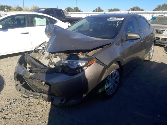 Photo 1 VIN: 5YFBURHE6KP885105 - TOYOTA COROLLA L 