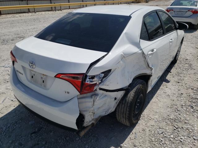 Photo 3 VIN: 5YFBURHE6KP885797 - TOYOTA COROLLA L 