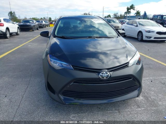 Photo 5 VIN: 5YFBURHE6KP886965 - TOYOTA COROLLA 