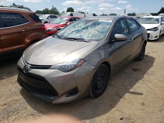 Photo 1 VIN: 5YFBURHE6KP887131 - TOYOTA COROLLA L 