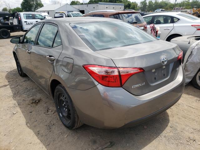 Photo 2 VIN: 5YFBURHE6KP887131 - TOYOTA COROLLA L 