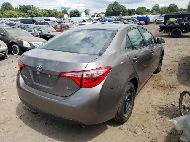 Photo 3 VIN: 5YFBURHE6KP887131 - TOYOTA COROLLA L 